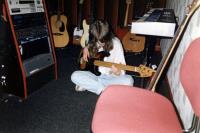 Alan trying the studio's fretless bass.