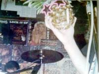 A pineapple in pink sunglasses